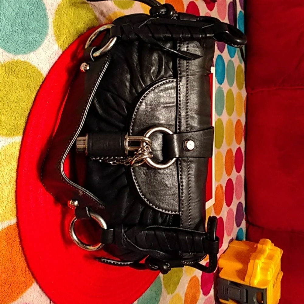 Authentic NWOT Francesco Biasia thick Leather bag.